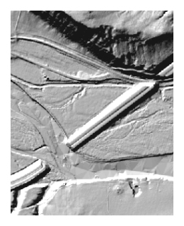 Shaded relief image showing the river channel, hills, and highway construction topography